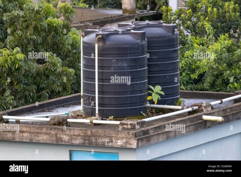 black-plastic-water-tanks-on-a-house-roof-in-bangladesh-3C68X89